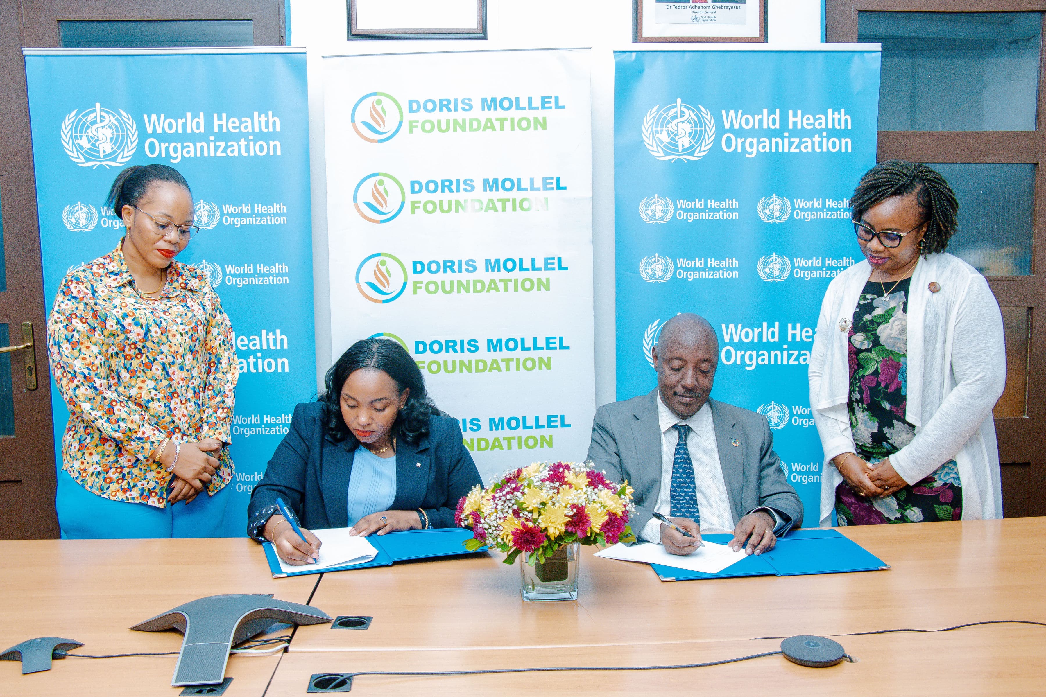 Doris Mollel Foundation and WHO Tanzania representatives sign a partnership agreement