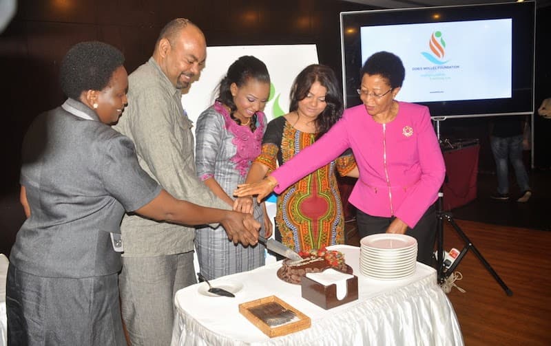 Official launch of the Doris Mollel Foundation at Hyatt Regency Dar es Salaam, March 2015, including foundation branding on screen.